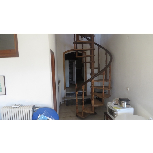 From sitting room to kitchen and stairs to up floor
